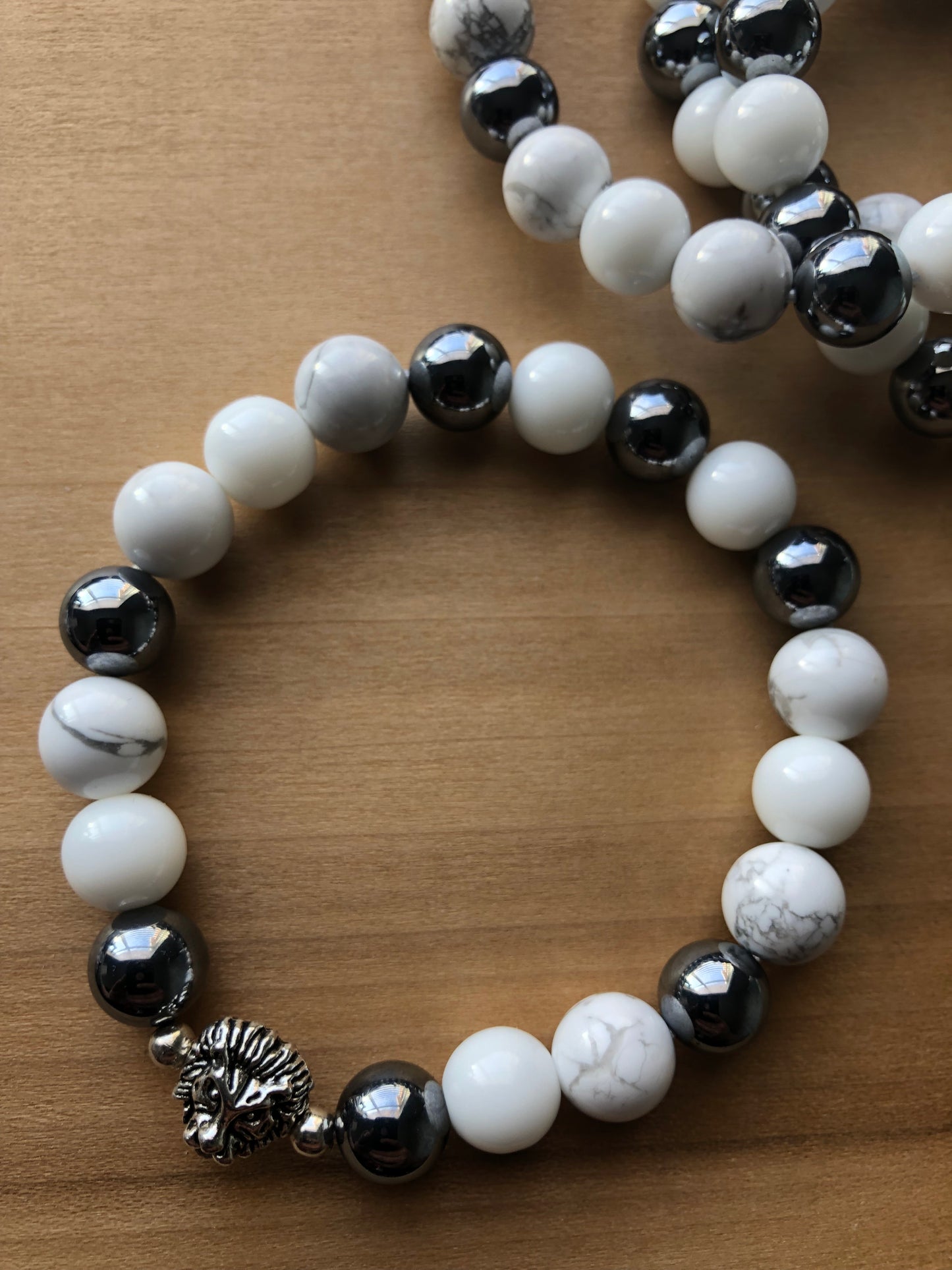 "Invicta" - Howlite, Hematite, White Jade with Silver Spacers and Lion Head Bead Stretch Bracelet