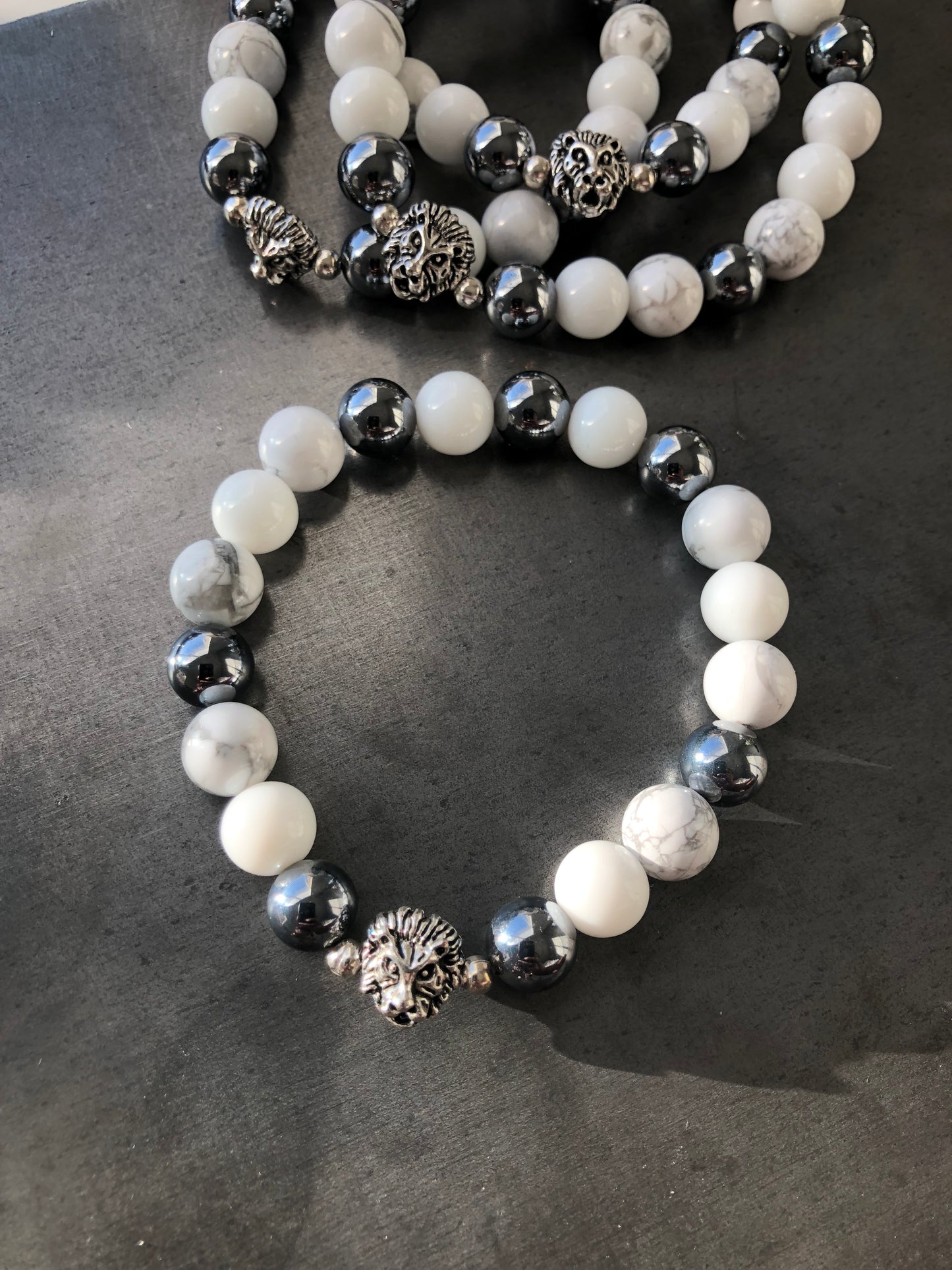 "Invicta" - Howlite, Hematite, White Jade with Silver Spacers and Lion Head Bead Stretch Bracelet