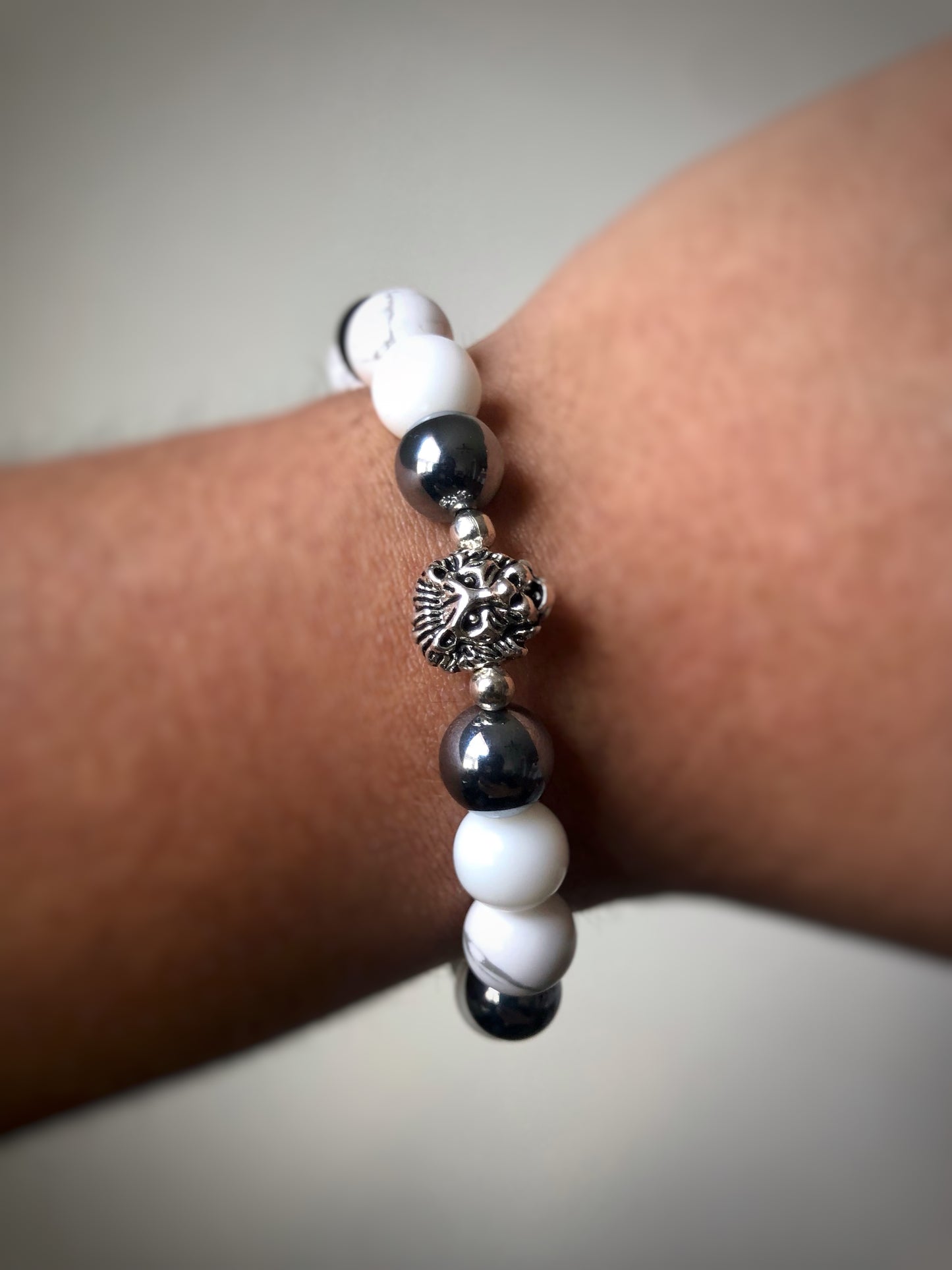 "Invicta" - Howlite, Hematite, White Jade with Silver Spacers and Lion Head Bead Stretch Bracelet